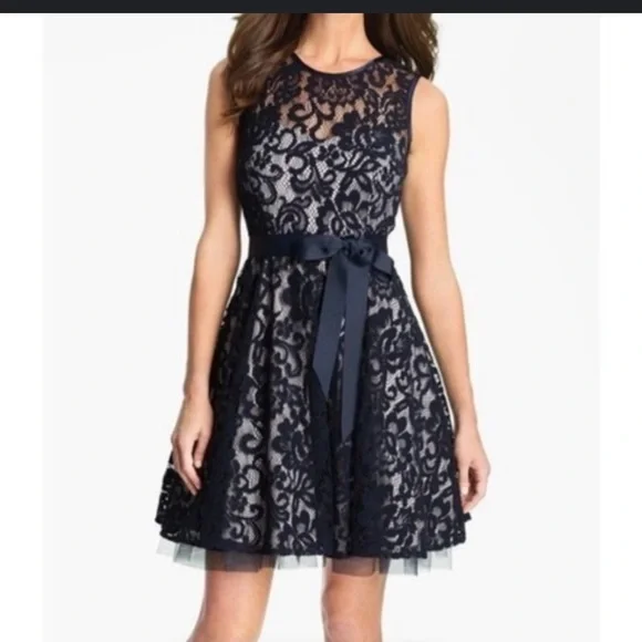 chinese dress ladies Betsy and Adam Cecelia Bateau Neckline Long Sleeves Intricate Lace Overlay  Back Zipper Closure Modern Fit Gown Dress main image 0